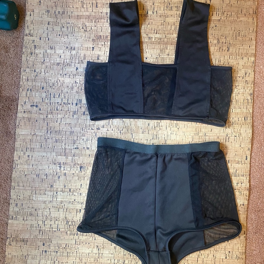 Black solid and mesh set worn twice